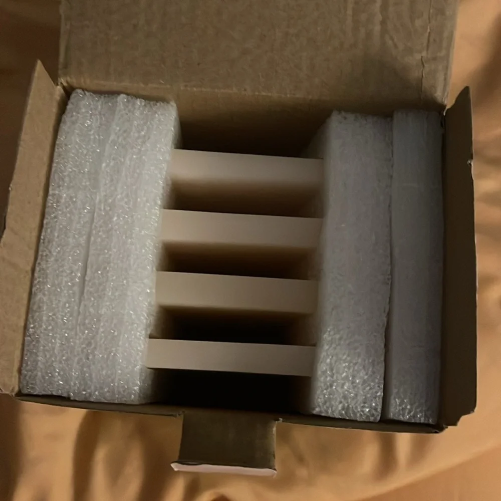 Ririku Resin Coasters new in box cream with white marbling‎ effect. Marked.
